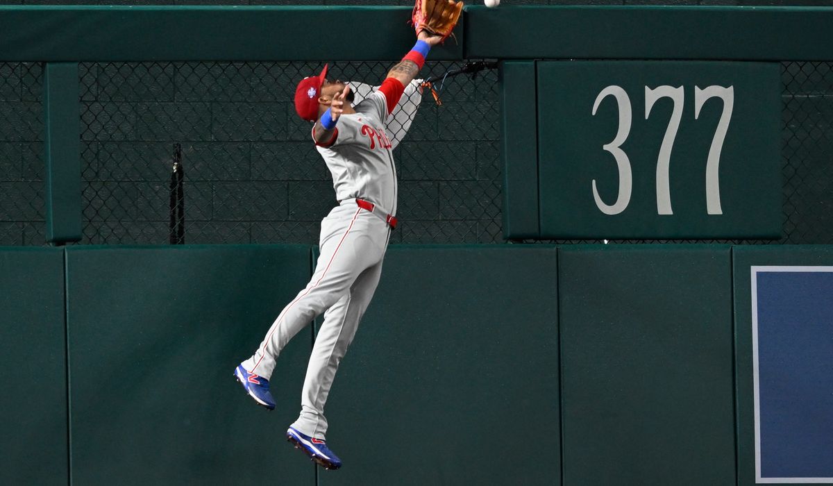 Phillies score eight runs in the ninth inning, rally past the Nationals