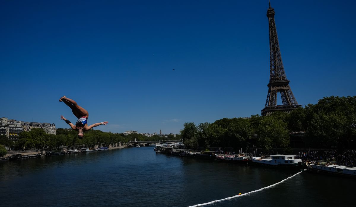 High divers take the plunge in the Seine in a new test of Paris’ reclaimed river